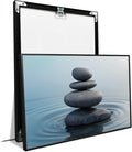 Zen wall art Harmonious grey stones stacked on a calm surface of water Serene Zen decor suitable for tranquil homes and spaces of meditation 12x18in Metal blackFramed