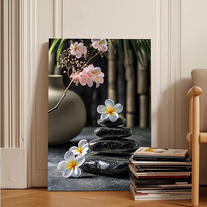 A harmonious black stone stack paired with white and pink flowers bamboo and ceramic vases creates a tranquil Zen decor for minimalist homes and mindful spaces 16x24in Wood Framed