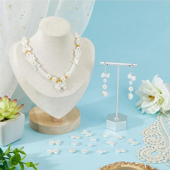 1 Box 7 Styles 700PCS Pearl Beads Kit with Hole Floral White ABS Plastic Heart Star Round Bow Assorted Imitation Pearls Loose Bead for Jewelry Making Bracelet Necklace DIY Crafts Supply
