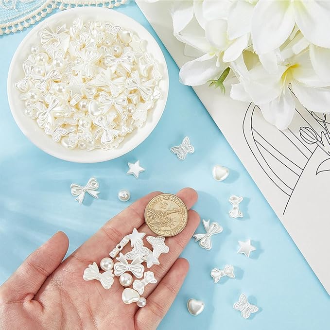 1 Box 7 Styles 700PCS Pearl Beads Kit with Hole Floral White ABS Plastic Heart Star Round Bow Assorted Imitation Pearls Loose Bead for Jewelry Making Bracelet Necklace DIY Crafts Supply