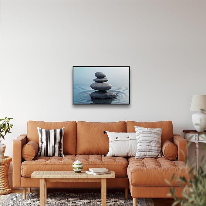 Zen wall art Harmonious grey stones stacked on a calm surface of water Serene Zen decor suitable for tranquil homes and spaces of meditation 12x18in Metal blackFramed