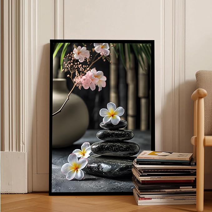 A harmonious black stone stack paired with white and pink flowers bamboo and ceramic vases creates a tranquil Zen decor for minimalist homes and mindful spaces 20x30in Metal blackFramed